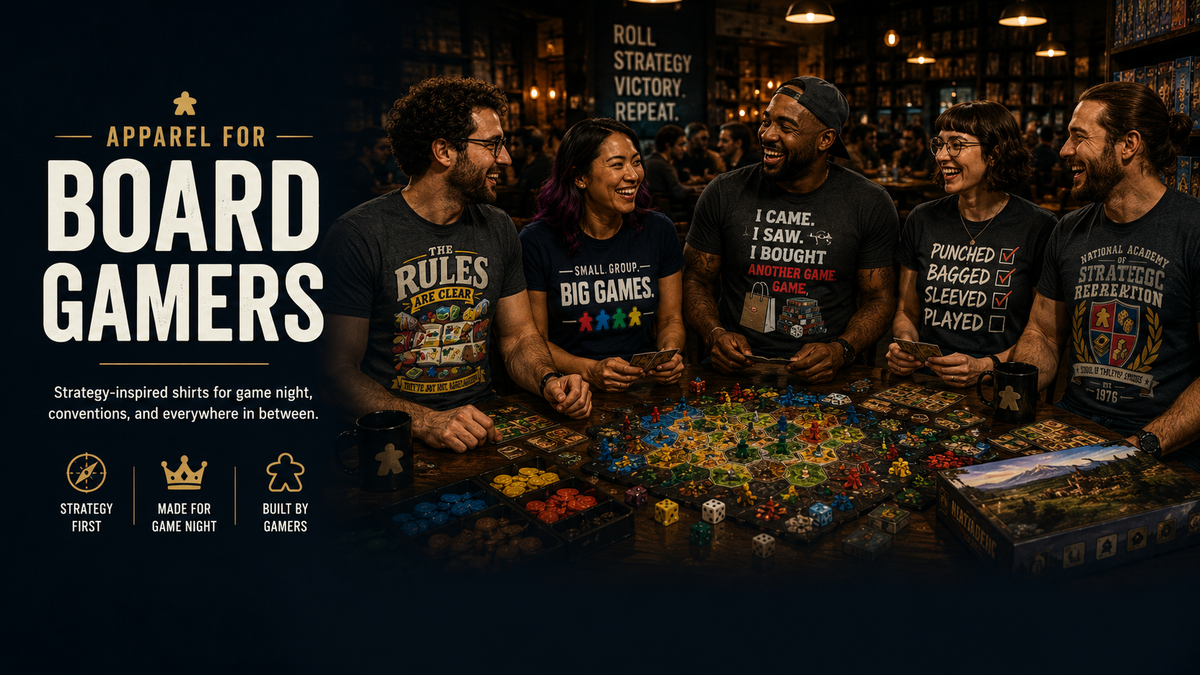 apparel for board games, five people wearing board game t-shirts standing around a table 